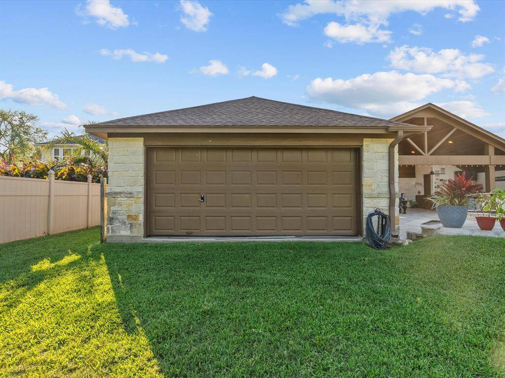 Rear of garage to open area and green space