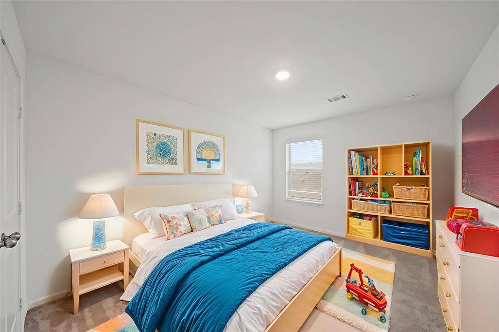 Your third bedroom offers a generous and inviting space that exudes warmth and versatility.- virtually staged