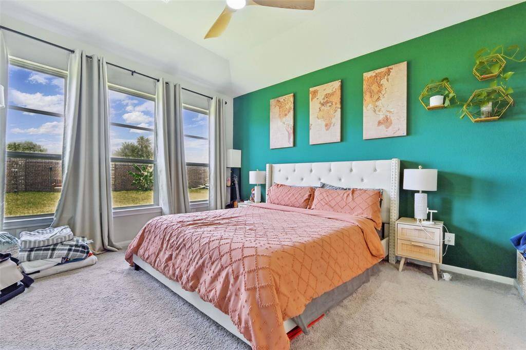 Primary bedroom features a private en-suite bath
