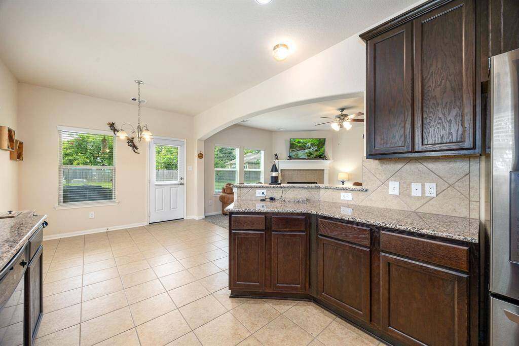 Breakfast area with entry way to the covered back patio