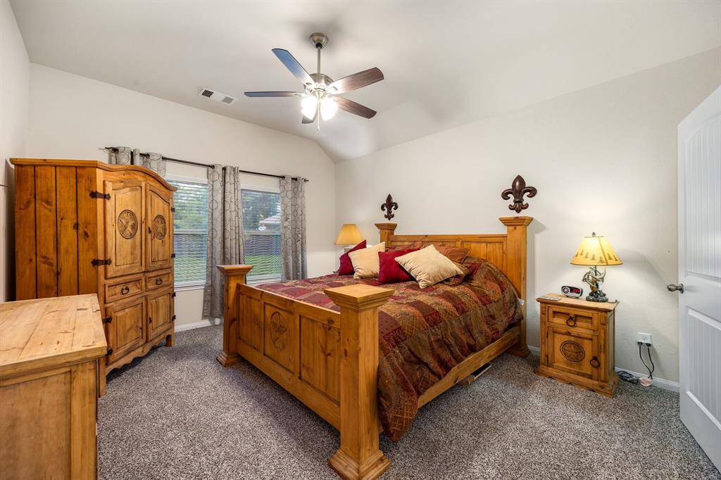 Primary bedroom with BRAND new carpet with ensuite bathroom
