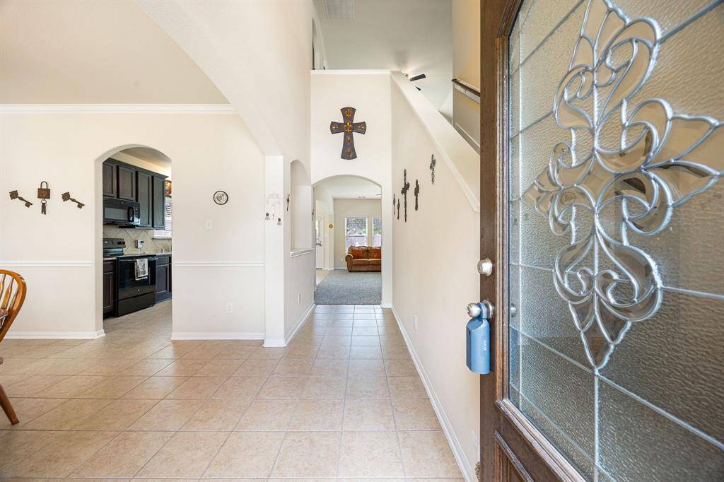 Front entry way with high ceilings and tons of natural light.