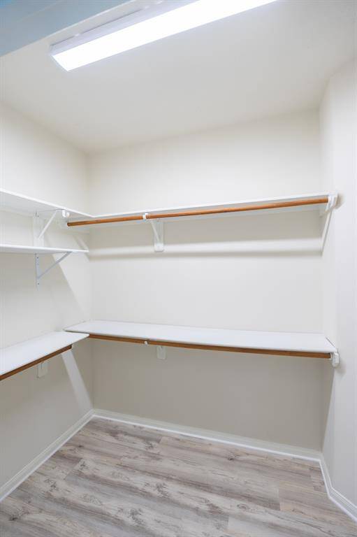 large closet in the primary bedroom closet