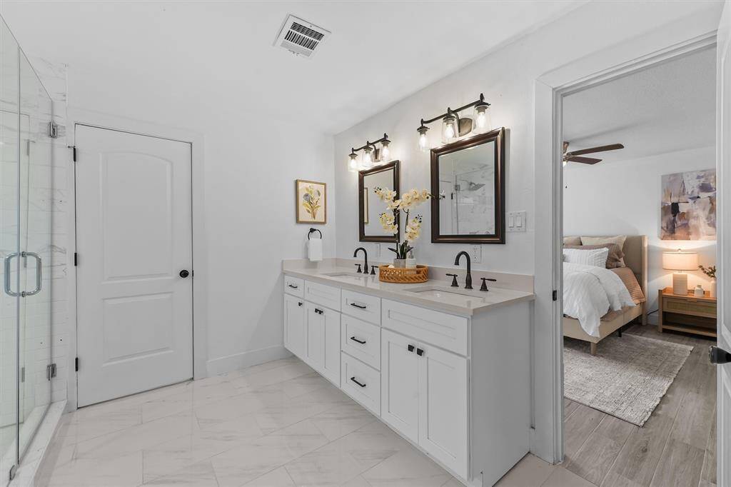Double sink vanity in the primary bathroom and TWO walk in closets.