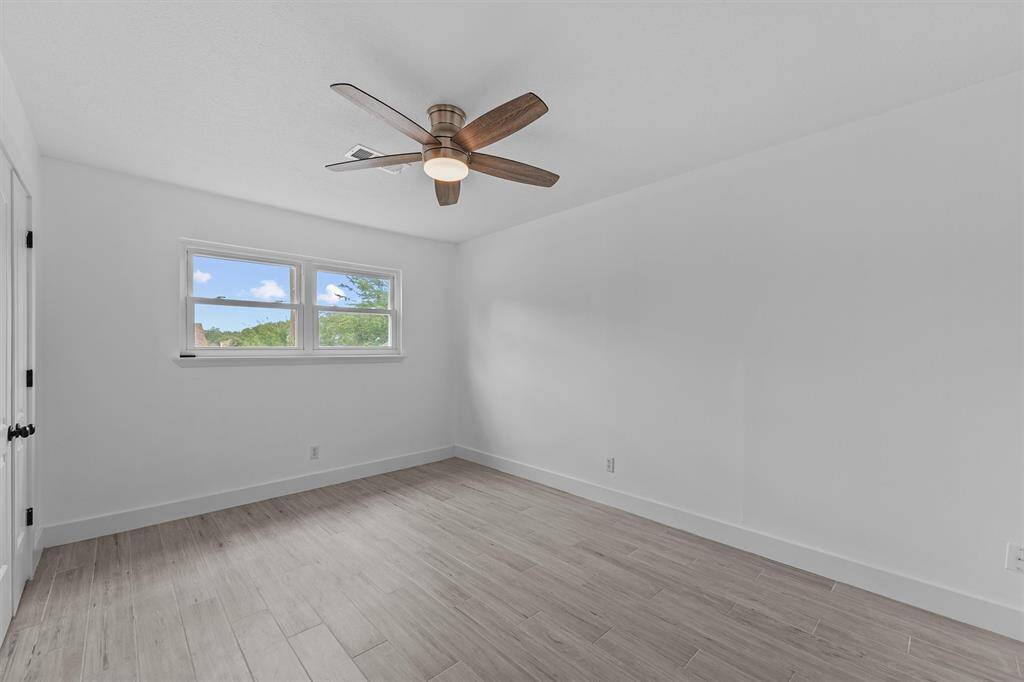 Secondary bedroom #3 is upstairs beside the game room.