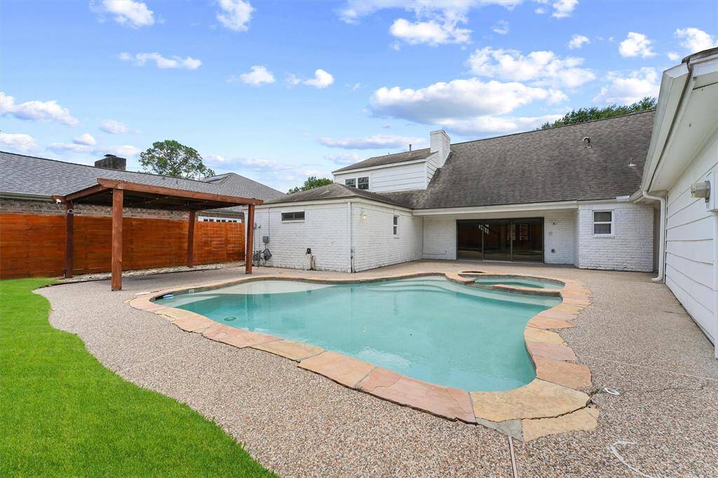 Gorgeous pool was re-plastered in 2020.  Even with the large pool, there is still grass space, which features a smart sprinkler.