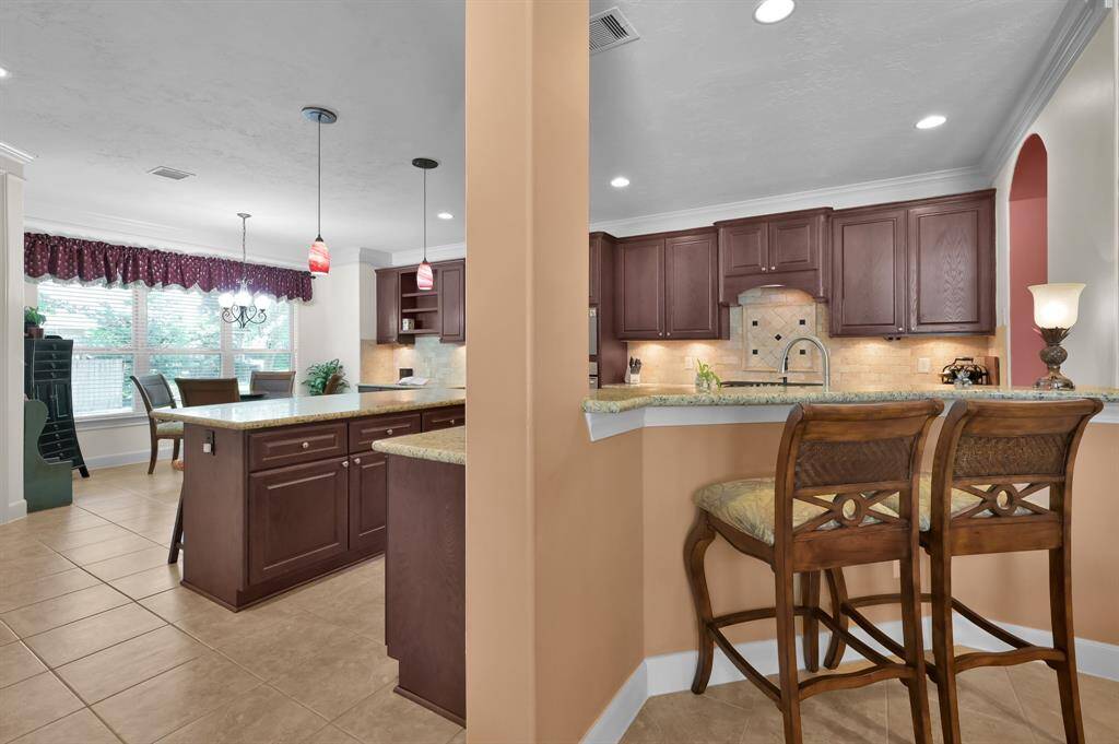 Expansive Kitchen Overlooks Living Room.