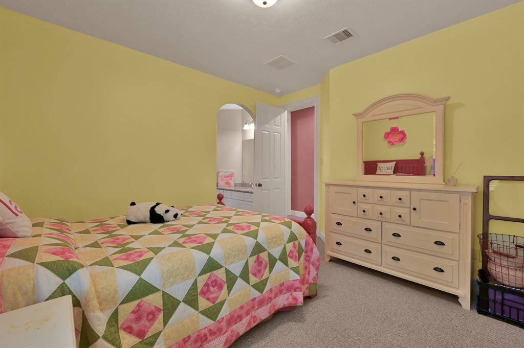 Secondary Bedroom Access to Jack and Jill Bathroom.