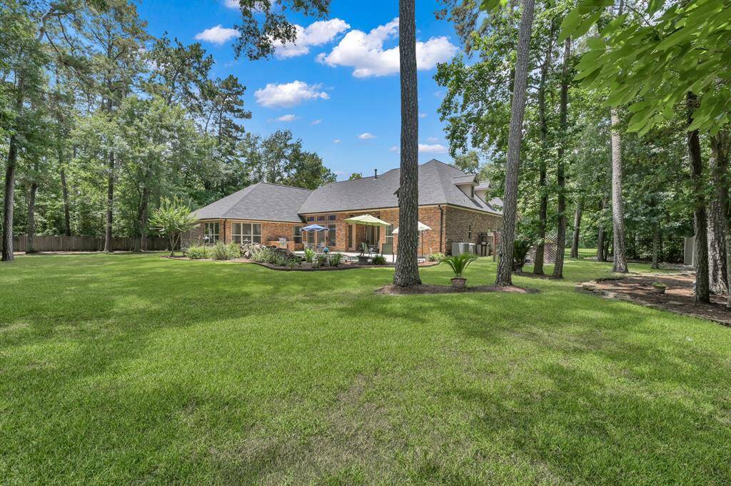 Mature Trees Add Shade and Character to Home.