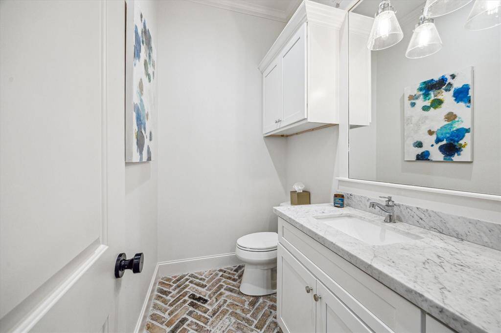 Half bath just off the mud room.