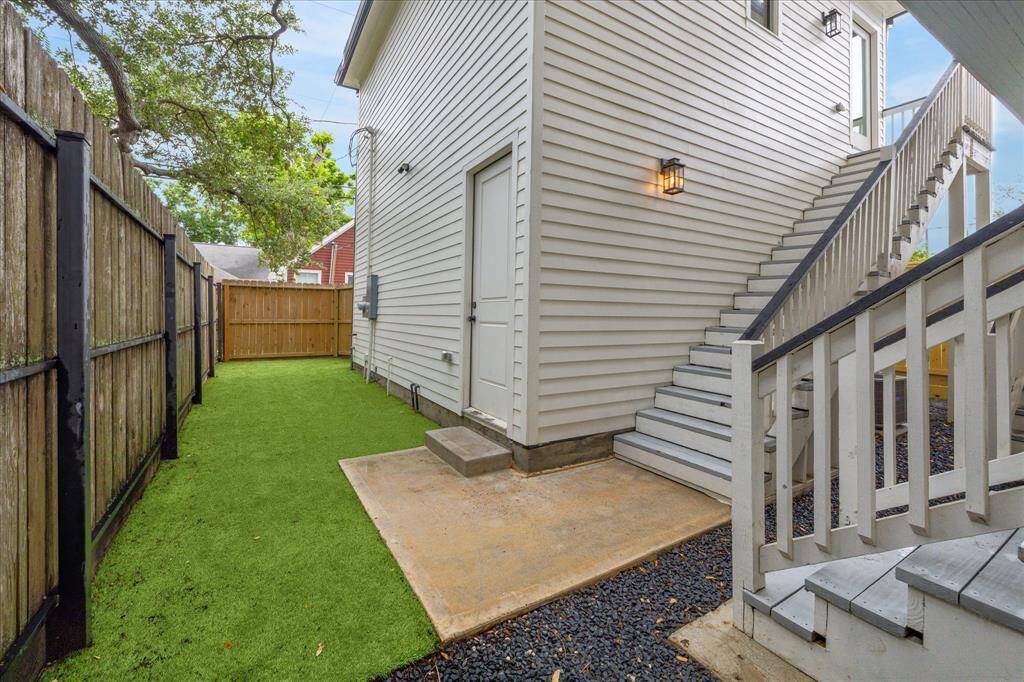 Out back you find a turfed yard, big enough to play games, enjoy an evening BBQ, or just relax, shaded by mature trees