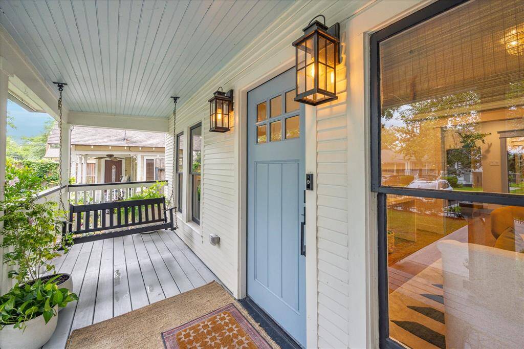 Inviting front porch with just the right pops of color