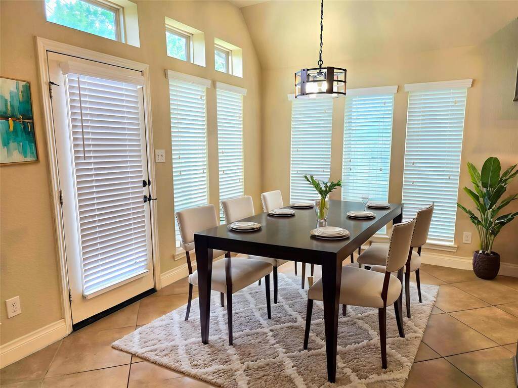 Breakfast Area. Virtually staged for furniture arrangement inspiration