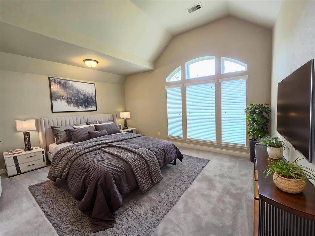Primary Suite with Recessed Ceiling and Natural Lighting. Virtually staged for furniture arrangement inspiration