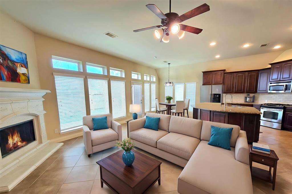 Open Living Room and Kitchen. Virtually staged for furniture arrangement inspiration
