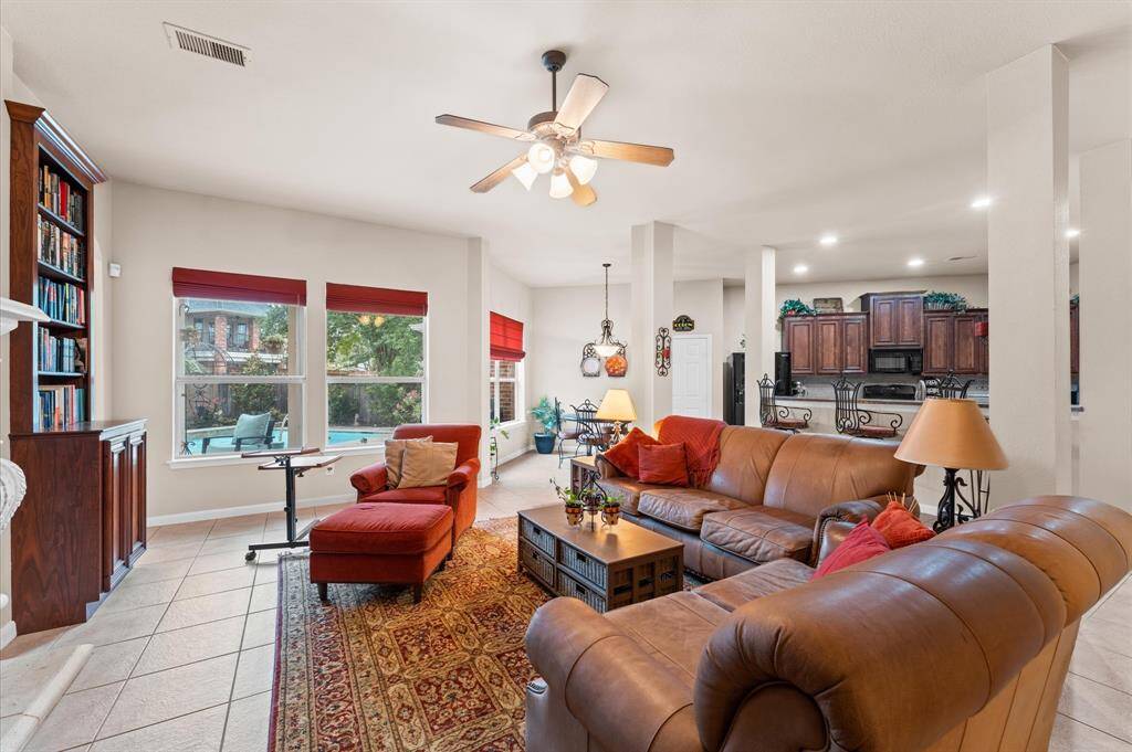 Living room with lots of natural light and view of the beautiful pool
