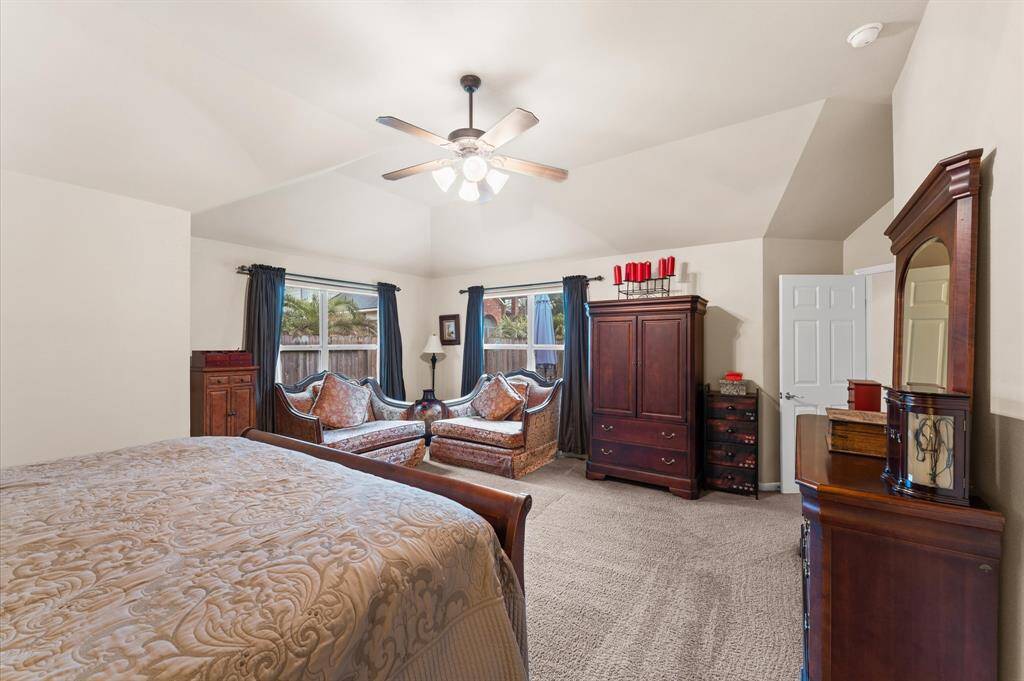 Primary bedroom with lots of space and view of the pool