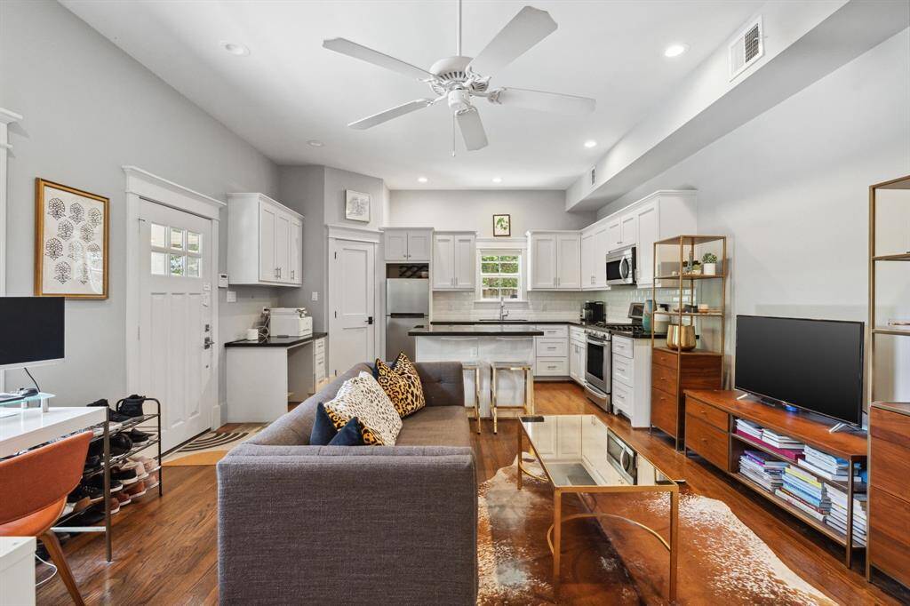 Charming 600 sqft garage apartment with full kitchen, living, bedroom, and bath.