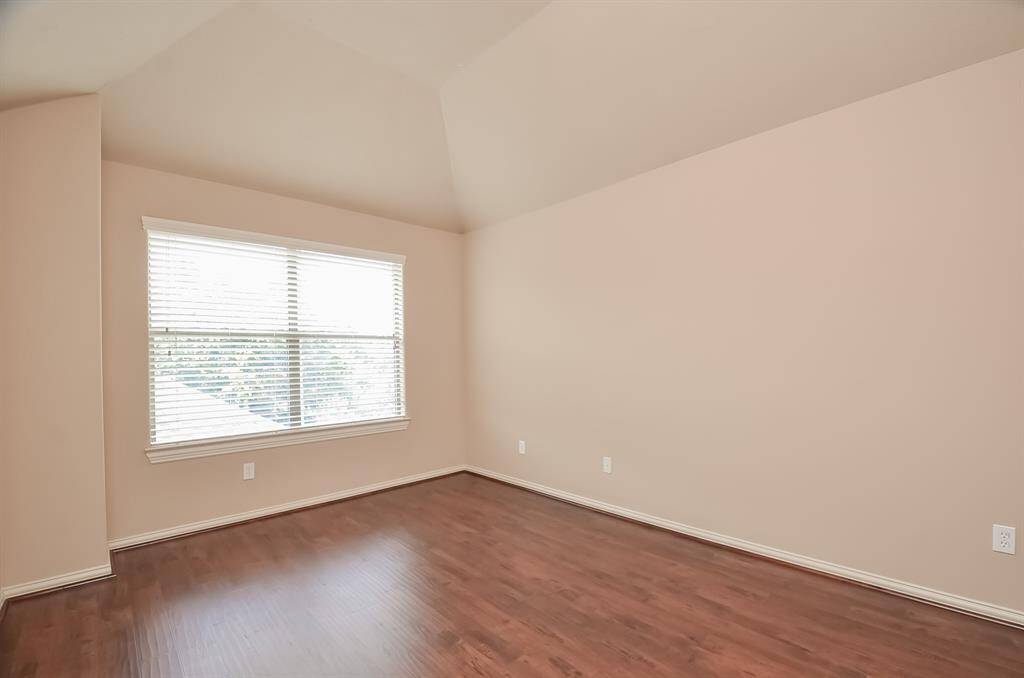 Enjoy the elegance of laminate flooring in every bedroom.