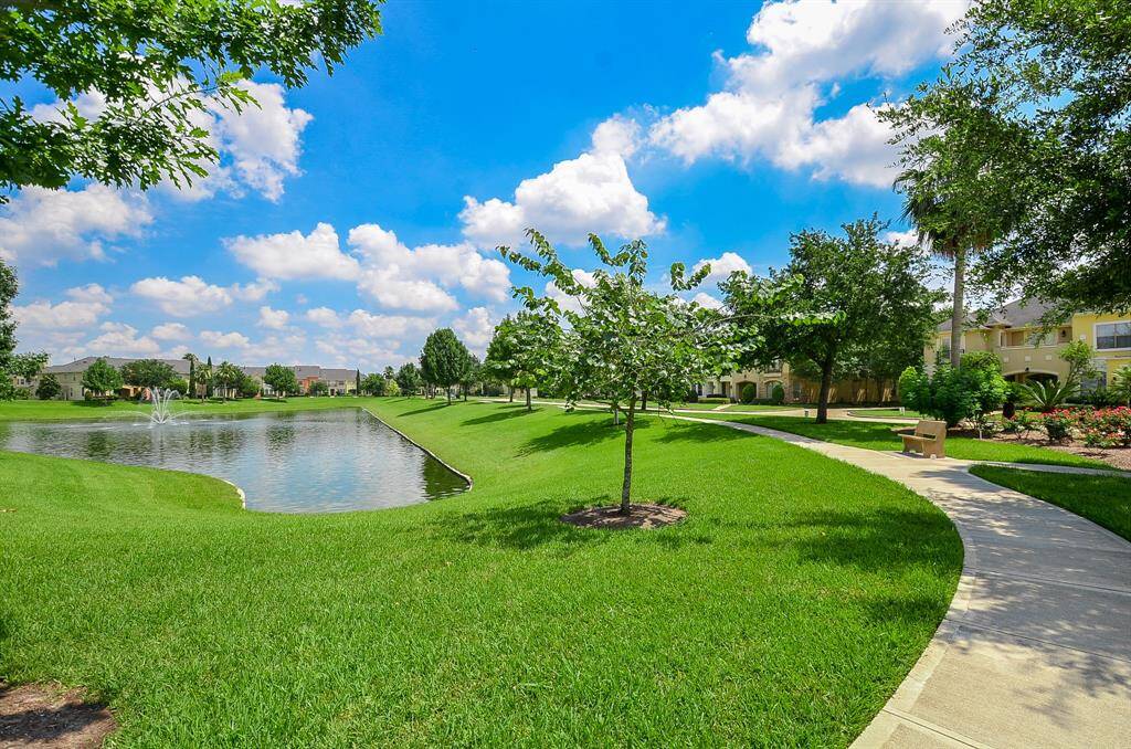 Enjoy serene lake views with walking and jogging paths, plus benches for relaxation.