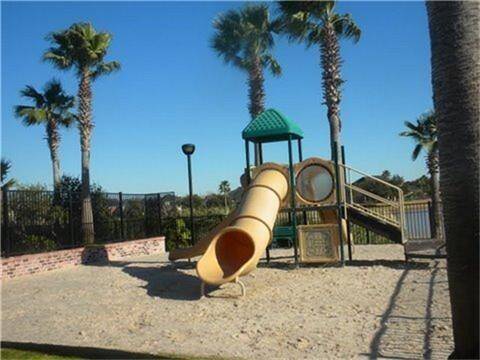 Experience family-friendly living with a neighborhood playground just steps away.