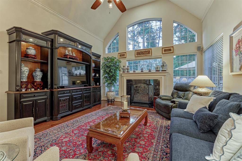 This warm and inviting family room is overly spacious perfect for large gatherings and entertaining.