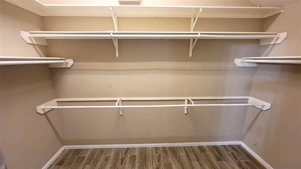 A dedicated laundry nook with washer/dryer hookups, conveniently located for easy access and organization.