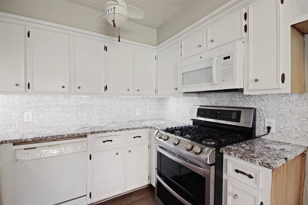 There is plenty of counter space and room for storage in this amazing kitchen!