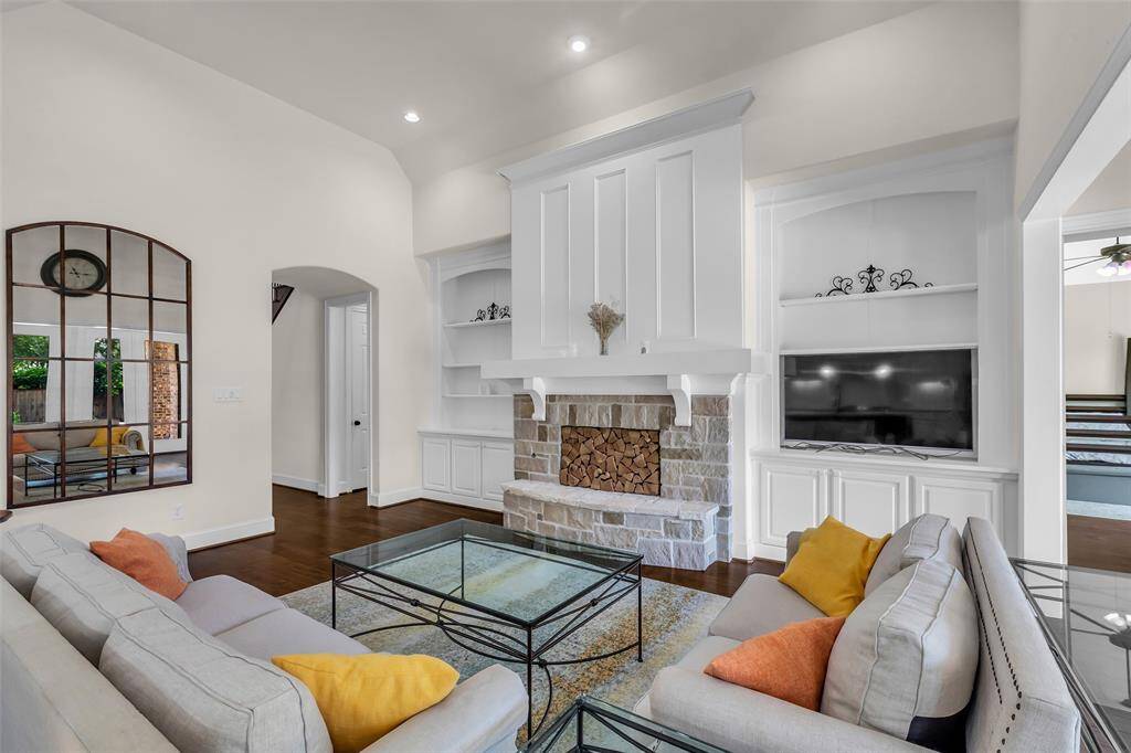 Living room with lots of natural light and gas fireplace