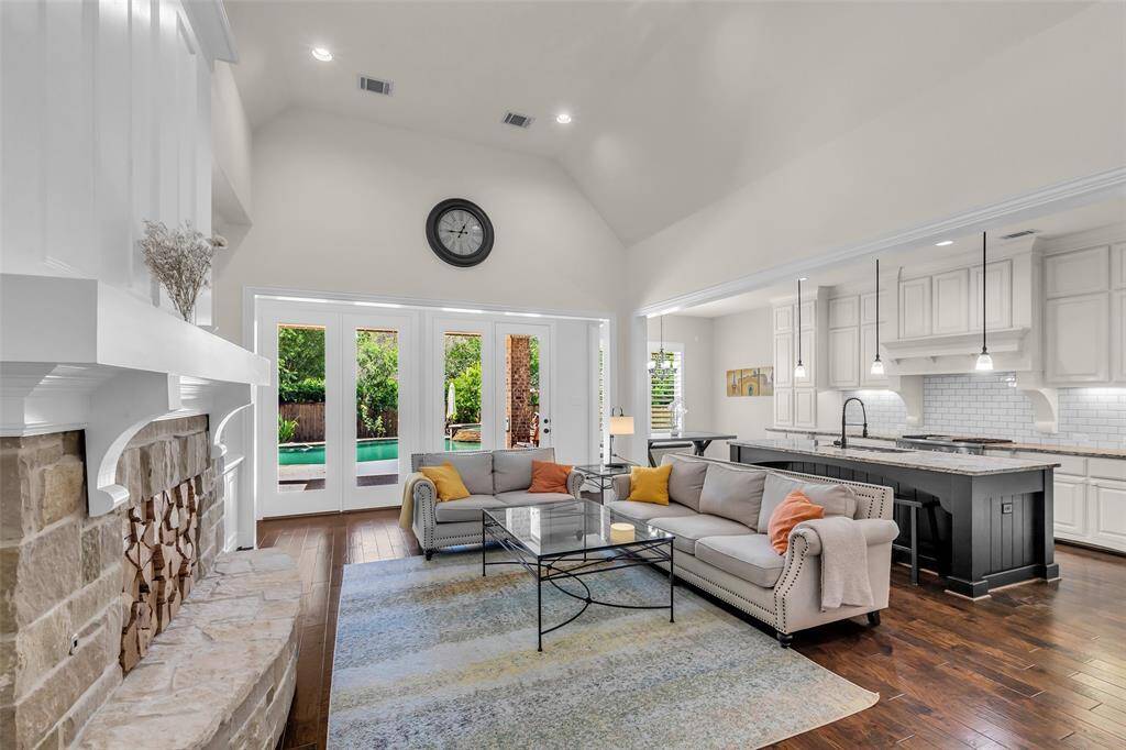 Open living room with views of the backyard