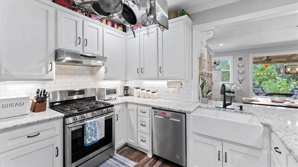 The Subway tile helps add a touch of class to this kitchen