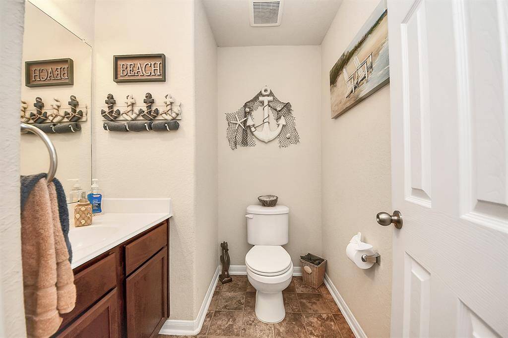 Convenient downstairs guest bath with stylish finishes.