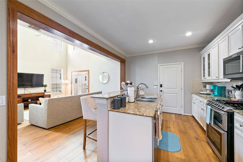 Breakfast bar. Door leads directly into your garage. Easy for bringing your groceries inside.