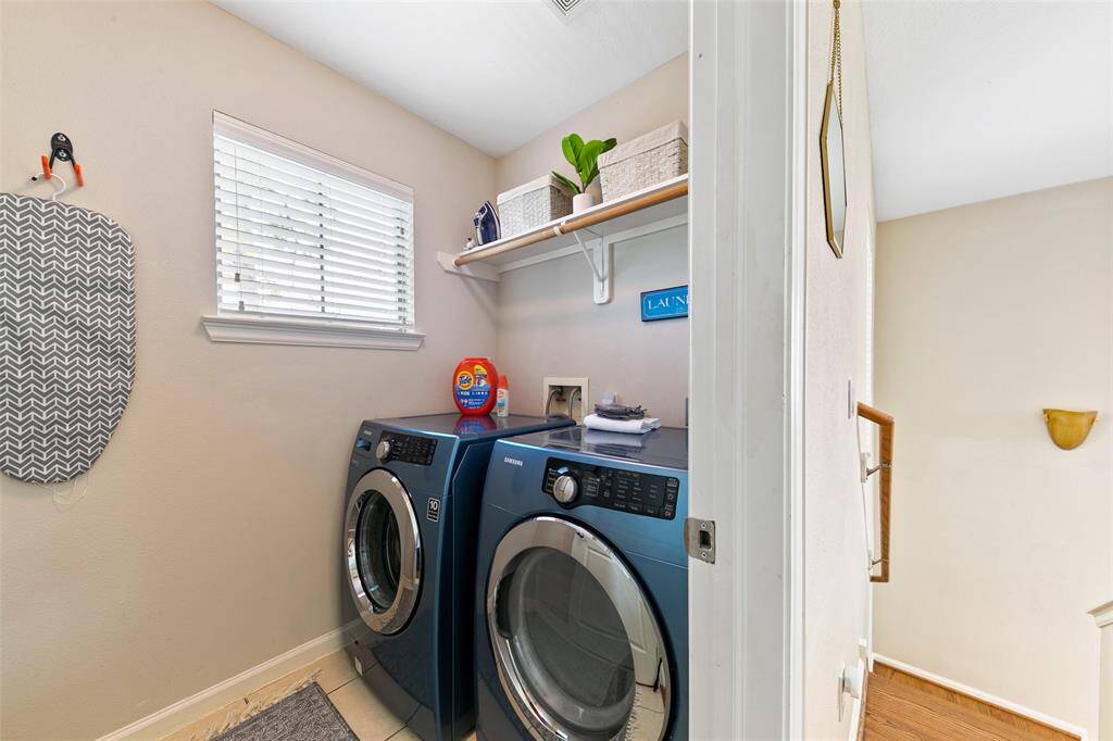 Laundry room conveniently located upstairs.