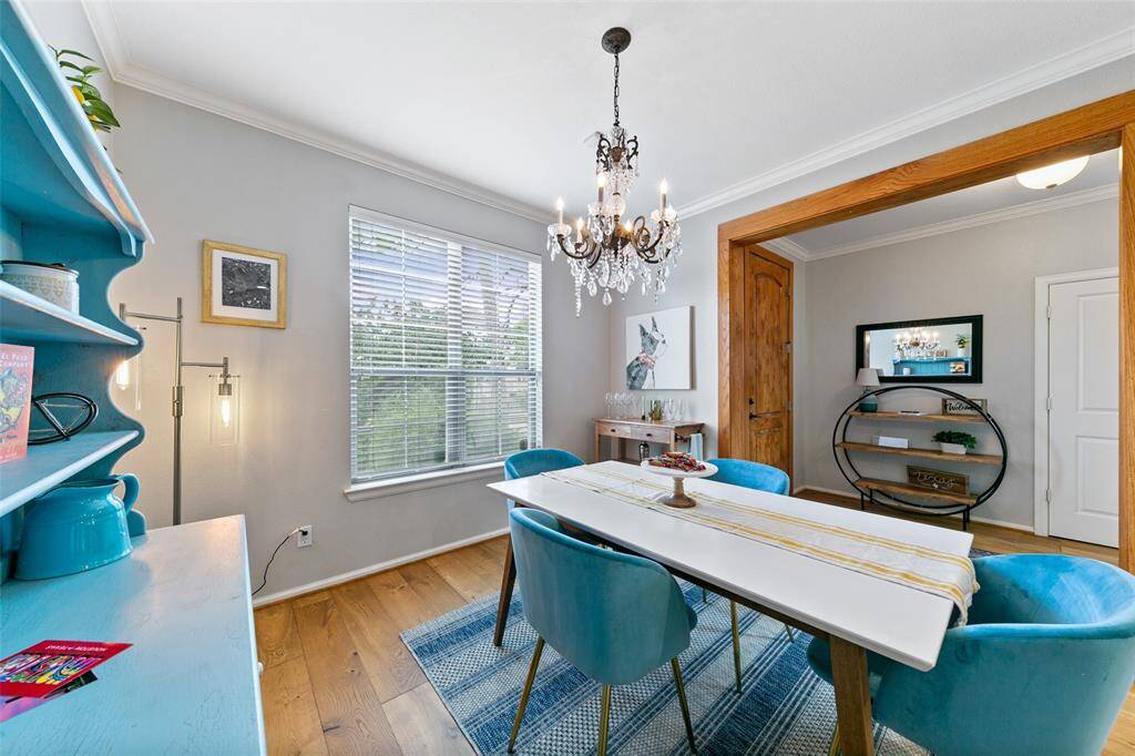 Upgraded wide plank hardwood floors throughout.