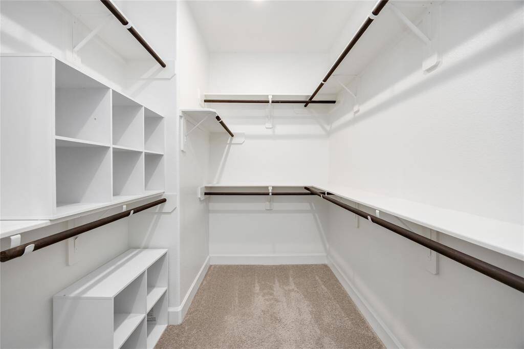Large walk in closet in primary suite