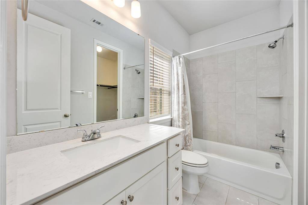 Secondary bedroom with ensuite bath