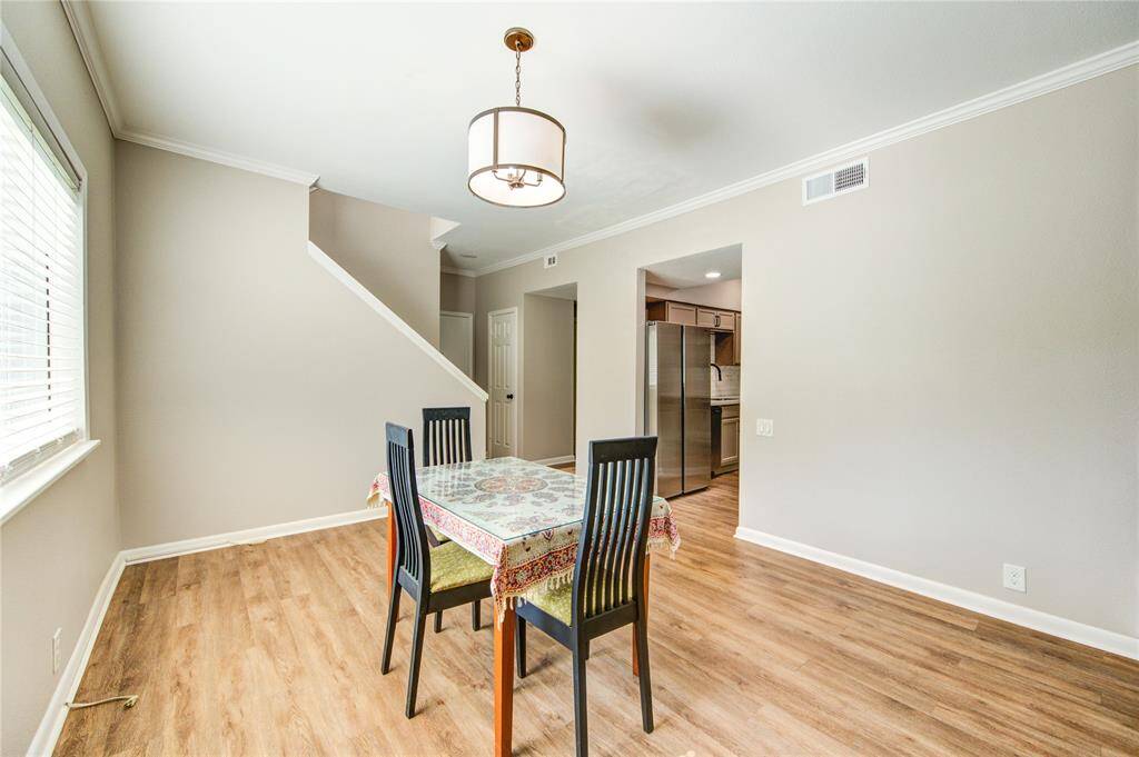 Dinning, entrance to the laundry, half bath and garage