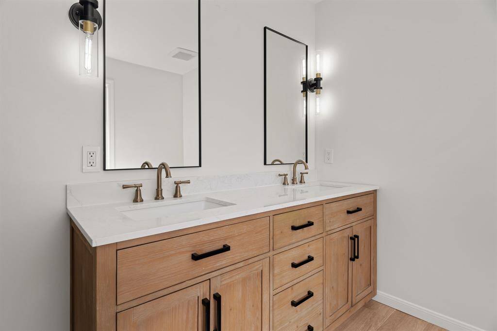 Dual vanities and sconce lighting!
