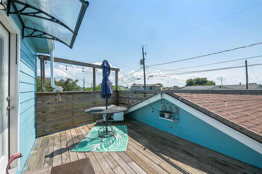 Charming upstairs patio with stunning water views.
