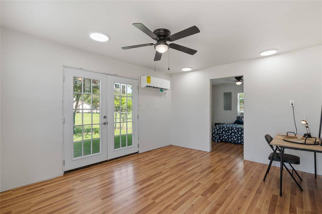 Welcoming breezeway on the first floor with convenient access to upstairs and a direct entry door. Perfect for easy movement and outdoor relaxation.