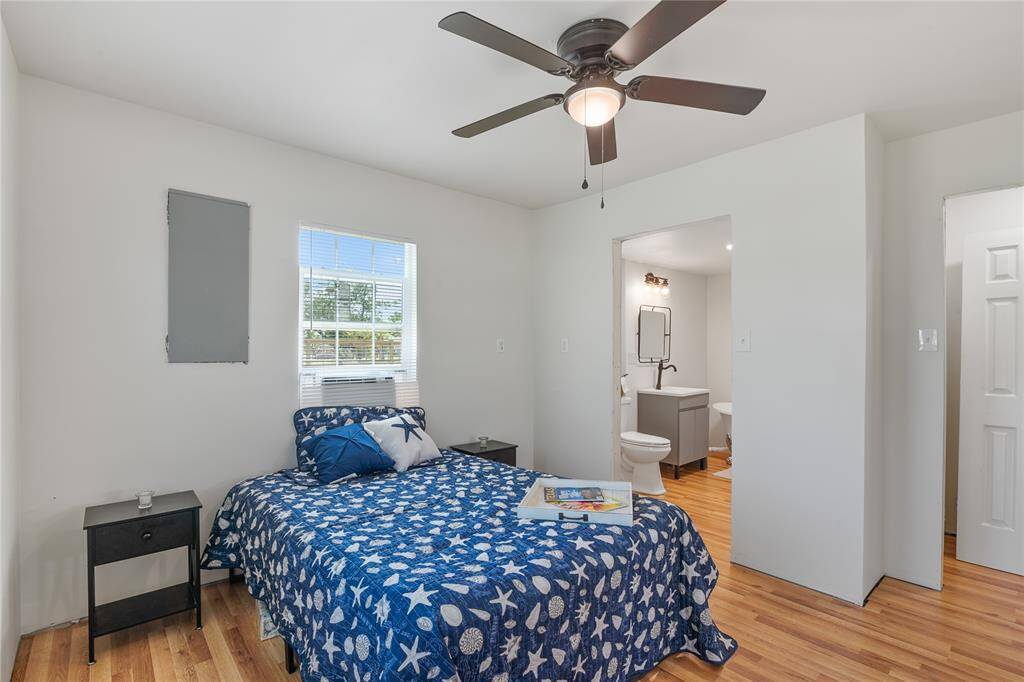 Experience seamless flow in the first-floor living room, with direct access to both the bedroom and family room.