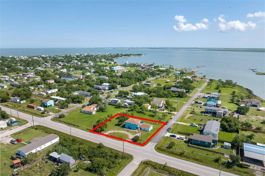 Discover your dream home with stunning aerial views of Dickinson Bay and Factory Bayou. Perfectly situated for serene waterfront living.