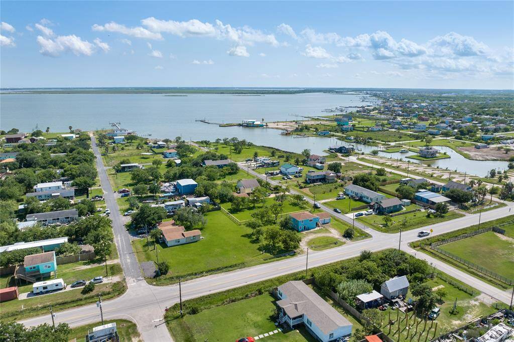 Experience stunning aerial views of this property with Galveston Bay as your backdrop, offering easy access to Topwater and the amenities San Leon has to offer.
