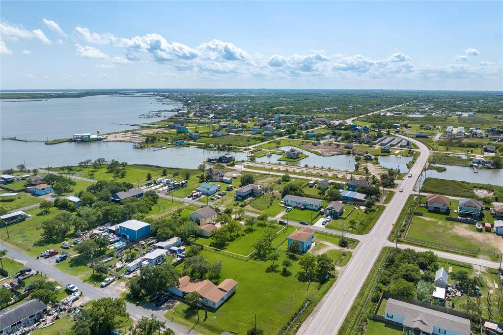 Spectacular aerial view showcasing the property with panoramic vistas of Dickinson Bay and Factory Bayou.
