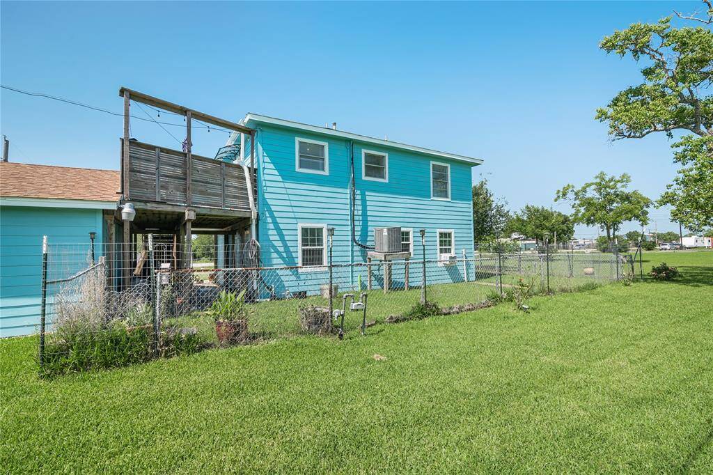 Discover the spacious backyard and charming deck of this inviting home, perfect for relaxation and outdoor gatherings.