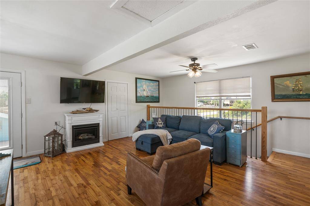 Spacious and inviting 2nd-floor family room with abundant natural light, perfect for relaxation and entertainment.