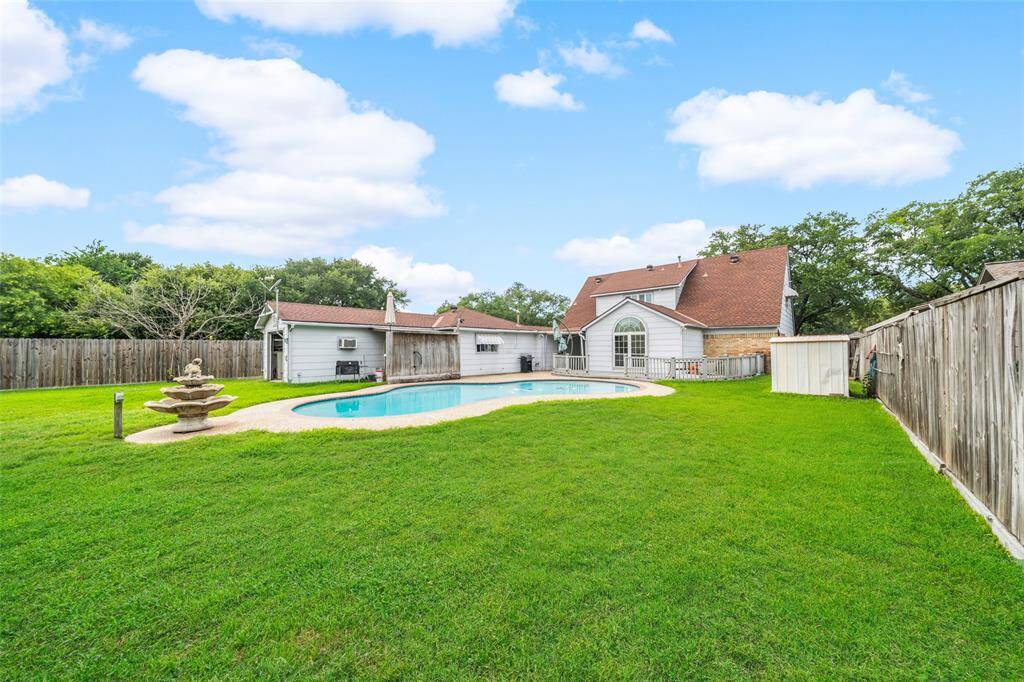 Expansive 12,750 sq ft lot—ideal for your dream home and outdoor oasis.