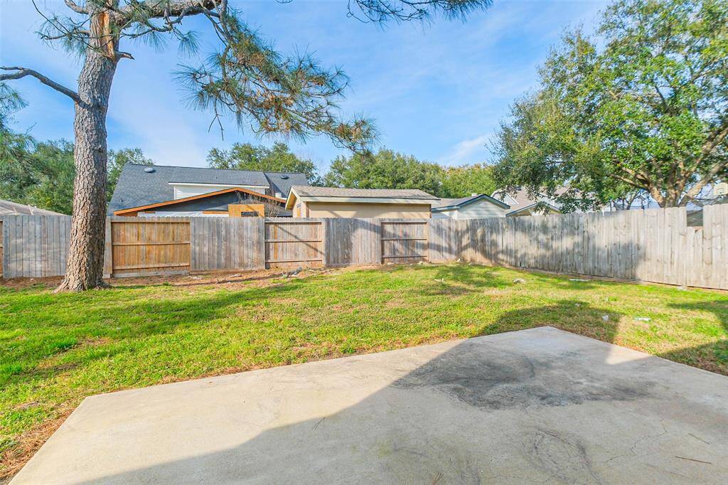 fully fenced in backyard access from the family room.