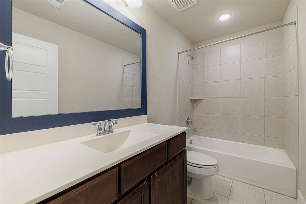 Style & Functionality – Spacious Downstairs Full Bathroom for Comfort and Convenience.